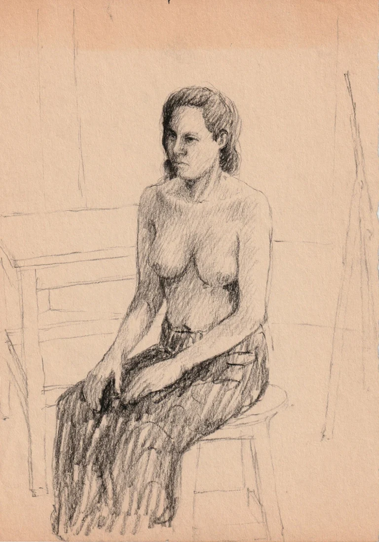 Mujer sentada.